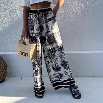 Wide palazzo pants for Damen with floral pattern and elastic waistband Chic and Style