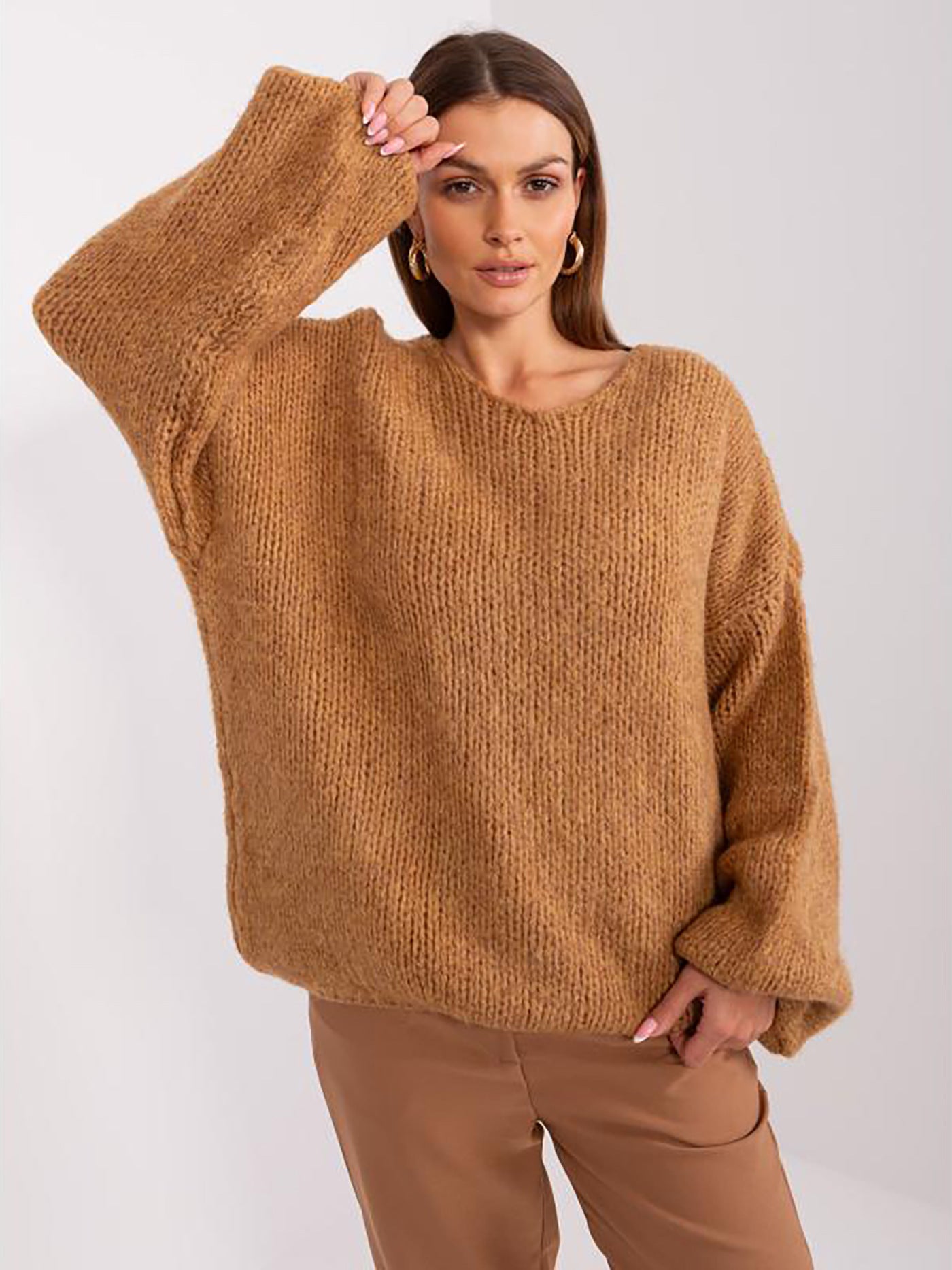 Pull en maille surdimensionné confortable pour dames avec des manches volumineuses et un design texturé Chic und Stil
