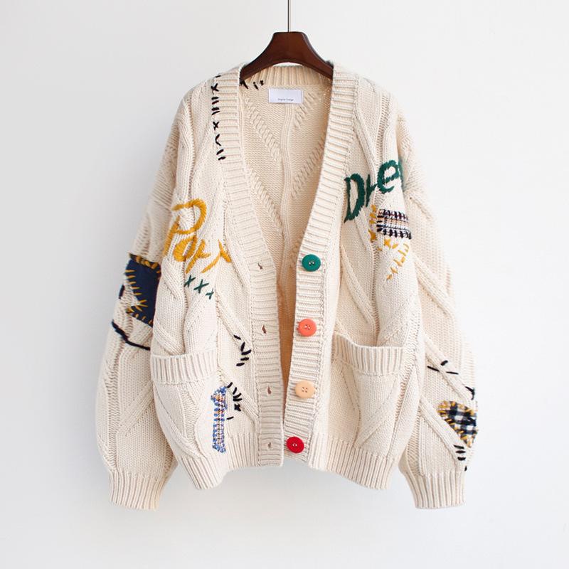 Dames cardigan en tricot doublé avec des boutons colorés et un design unique Chic und Stil