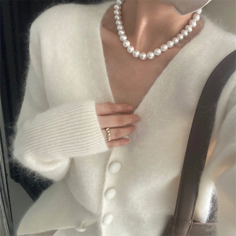 Cardigan femme avec décolleté en V profond et matière fluide douce Chic und Stil