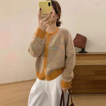 Ladies cozy knitted pullover with heart-shaped buttons and contrast ribbed details Chic and Style