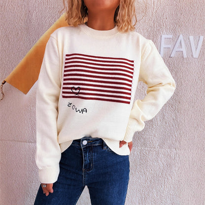 Pull décontracté pour femmes avec design rayé et application en forme de cœur Chic und Stil