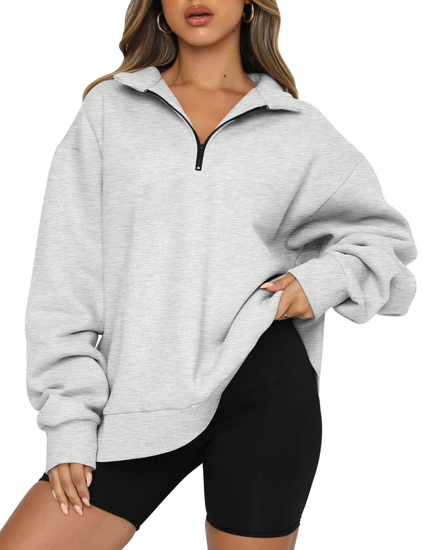 Pull décontracté pour femmes avec demi-zip et épaules tombantes Chic und Stil
