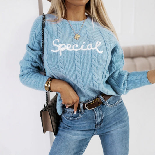 Pull en tricot pour dames avec motif torsadé et inscription brodée Chic und Stil