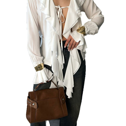 Blouse femme avec des volants volumineux et des poignets brillants Chic und Stil