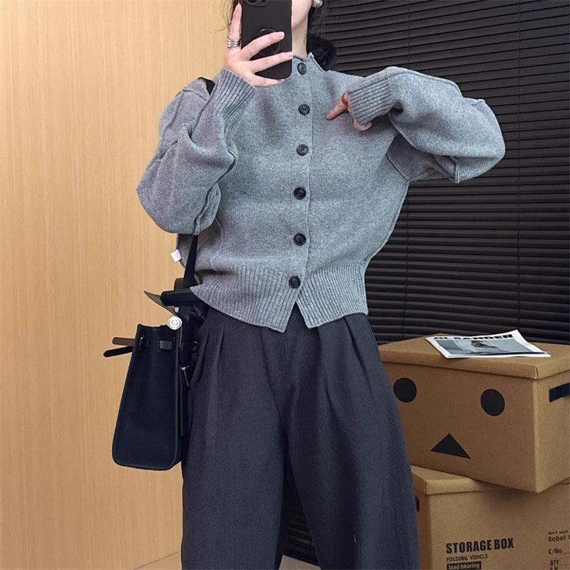 Cardigan femme avec détails de boutons et manches à larges côtes Chic und Stil