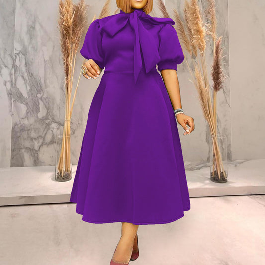 Robe midi femme avec col à nœud Chic und Stil