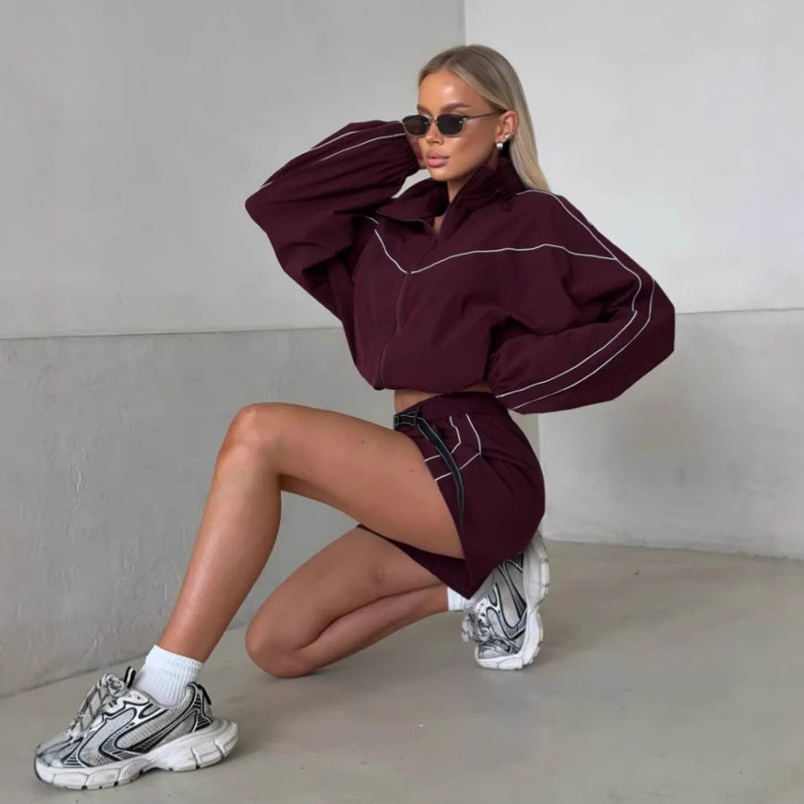 Sport leisure set for women with high collar jacket and Chic und Stil shorts