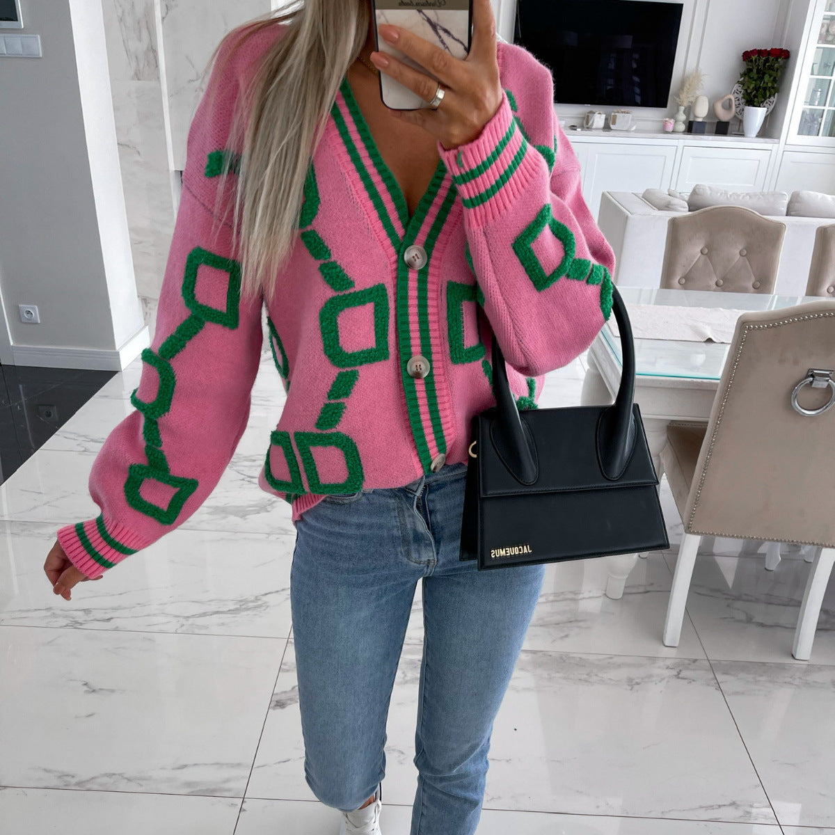 Cardigan féminin tricoté avec motif texturé et détails de boutons Chic und Stil