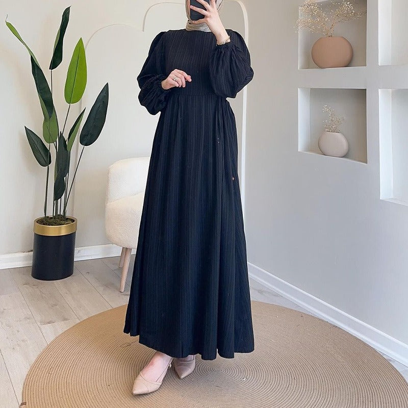 Robe maxi pour femmes avec un design plissé élégant et des manches bouffantes longues Chic und Stil