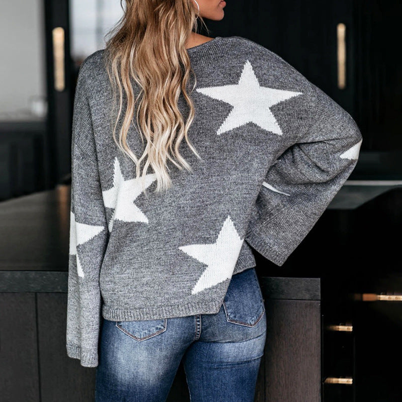 Pull féminin à la mode avec des manches largement évasées et motif d'étoiles Chic und Stil