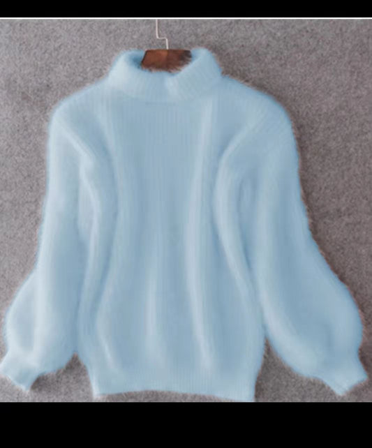 Pull en mohair pour femmes avec col roulé, manches bouffantes et design texturé Chic und Stil