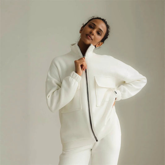 Women's comfortable fleece jacket with high collar and practical pockets. Chic and stylish.