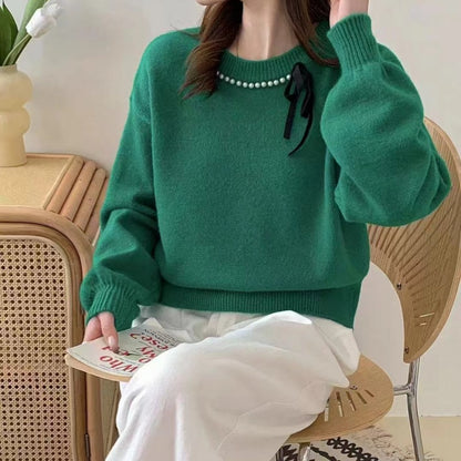 Dames pull mode avec bande décorative et détails en perles Chic und Stil