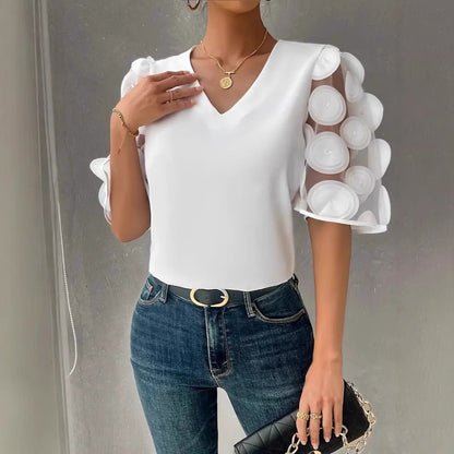 Dames Haut élégant avec des manches bouffantes transparentes et un décolleté en V Chic und Stil