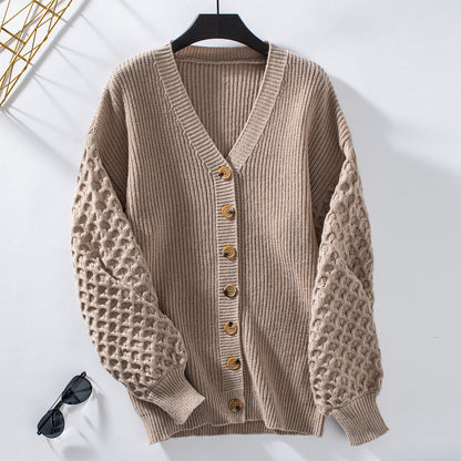 Veste en tricot pour femmes avec des manches texturées et des détails de boutons Chic und Stil