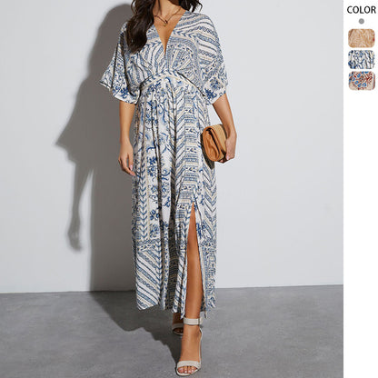 Robe maxi femme avec un élégant décolleté en V, fente sur le côté et motif floral Chic & Stil