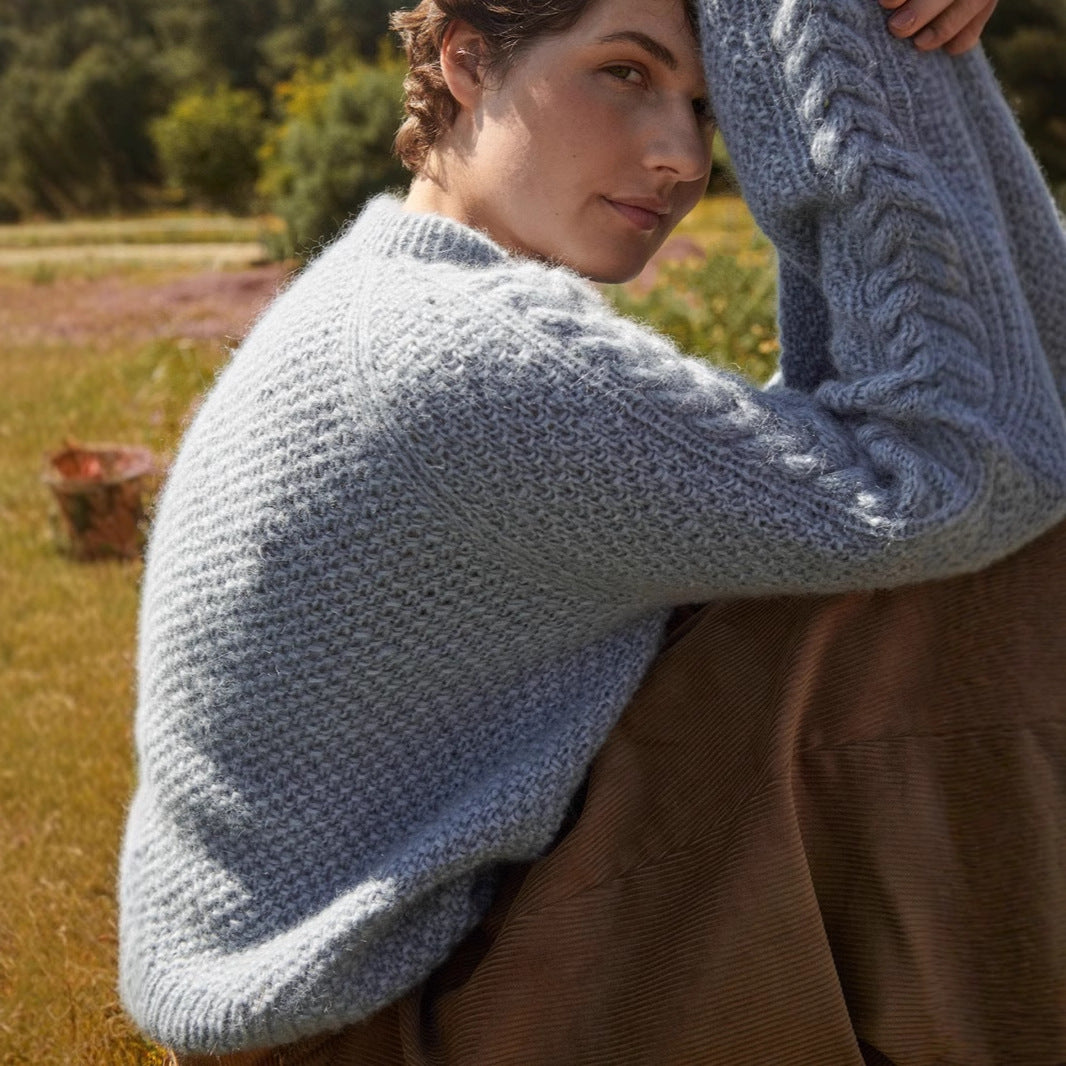 Pull en tricot pour femmes avec un design de torsades élaboré Chic und Stil