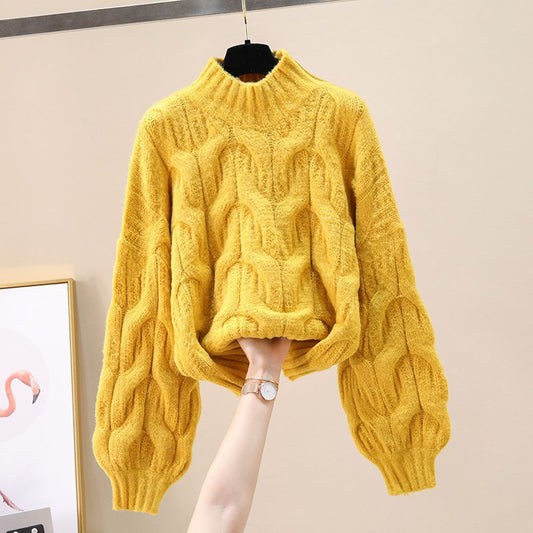 Pull en tricot confortable pour femmes avec des manches volumineuses et un motif torsadé Chic und Stil