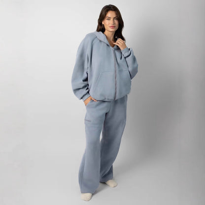 Femmes pull à capuche oversized à la mode avec pantalon de jogging assorti Chic und Stil