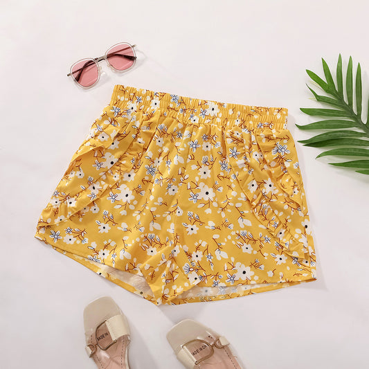 Shorts fleuris pour femmes avec taille élastique et poches latérales Chic und Stil