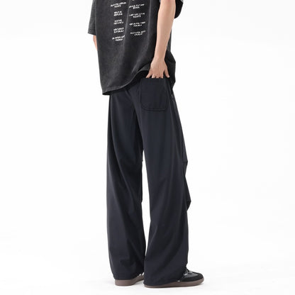 Loose sports pants for men with a remarkable draped design Chic and Style