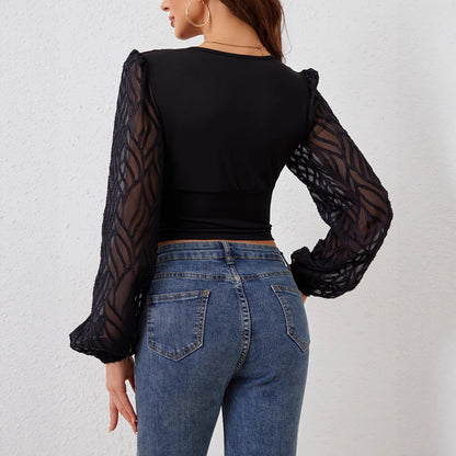 Chemisier pour femmes avec des manches transparentes élégantes et des détails ornés de boutons Chic und Stil