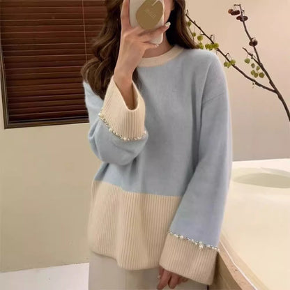 Pull en tricot à la mode pour femmes avec des manches ornées de perles Chic und Stil