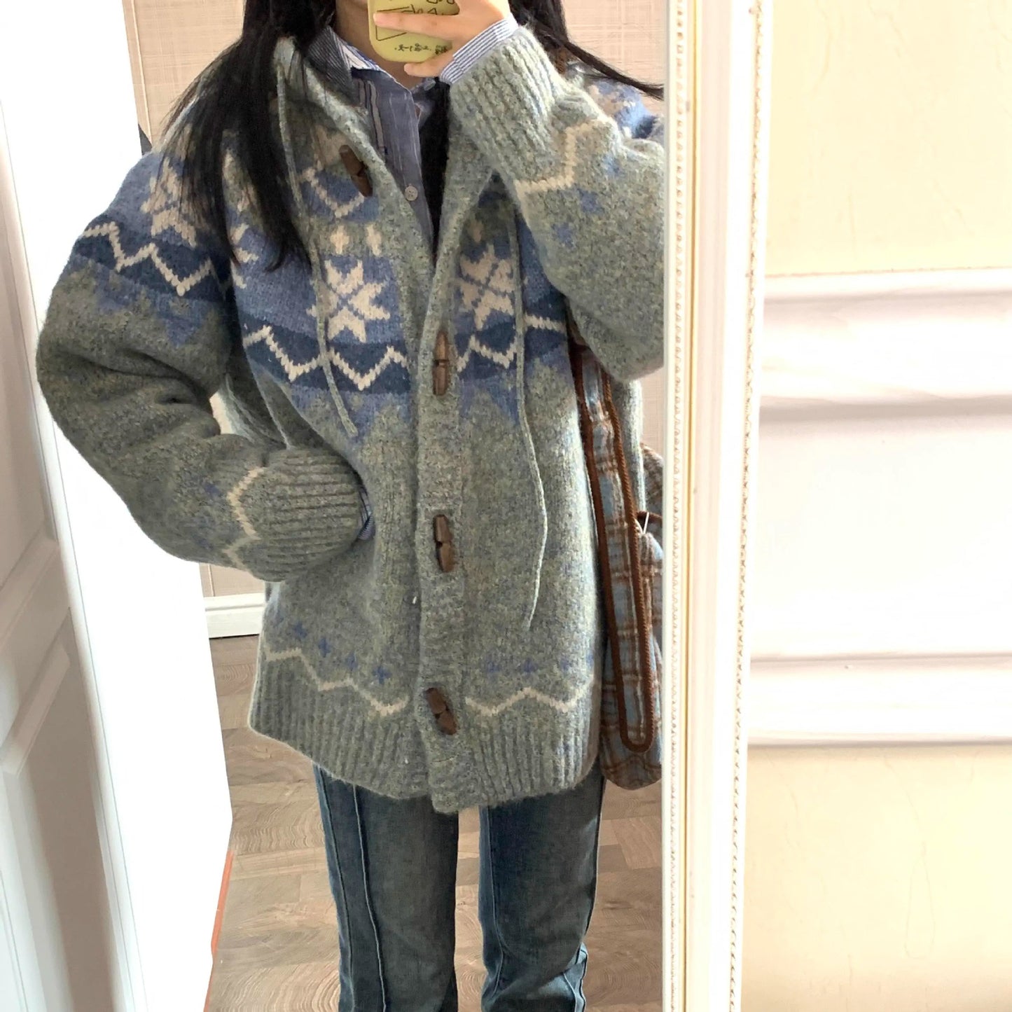 Ladies fluffy knit pullover with high collar and chic and stylish embellishments