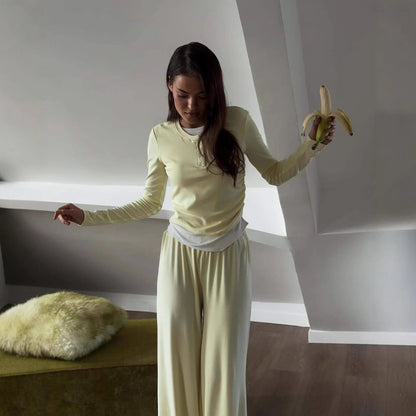 Fashionable lounge set for women with a versatile top and chic elastic pants.