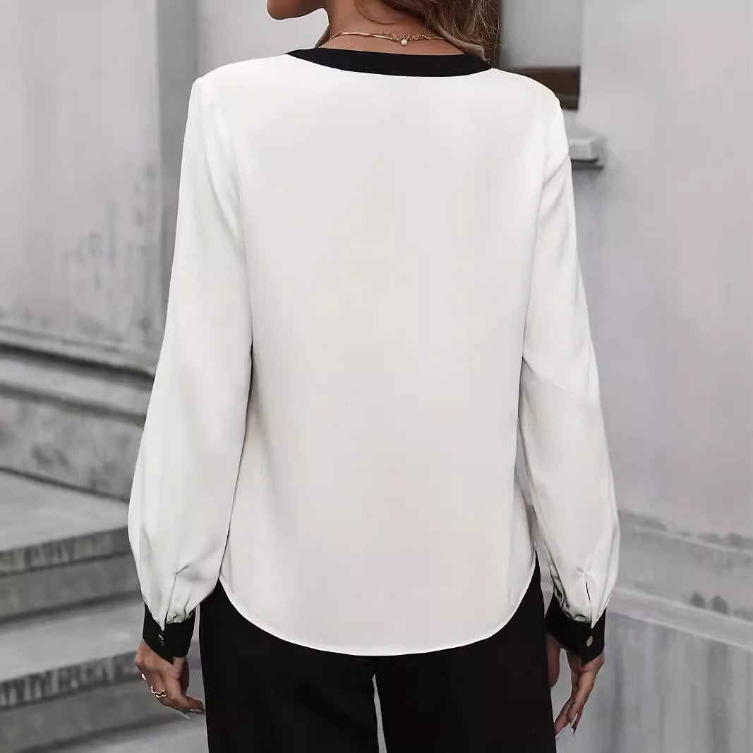 Dames bluse élégante avec des détails contrastés Chic und Stil