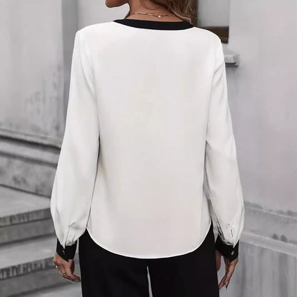 Dames bluse élégante avec des détails contrastés Chic und Stil