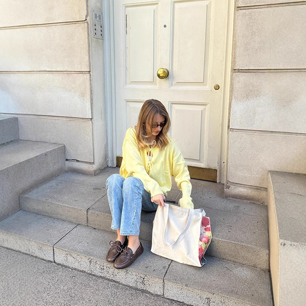 Dames cardigan en tricot léger avec lien décoratif Chic und Stil