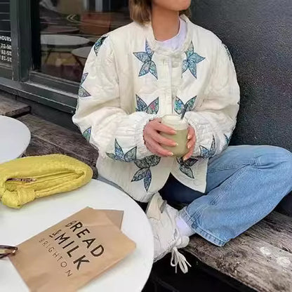 Dames blouson matelassé avec design floral et bords élastiques Chic und Stil