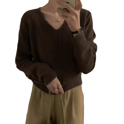 Pull en tricot pour femmes avec décolleté en V et motif torsadé Chic und Stil