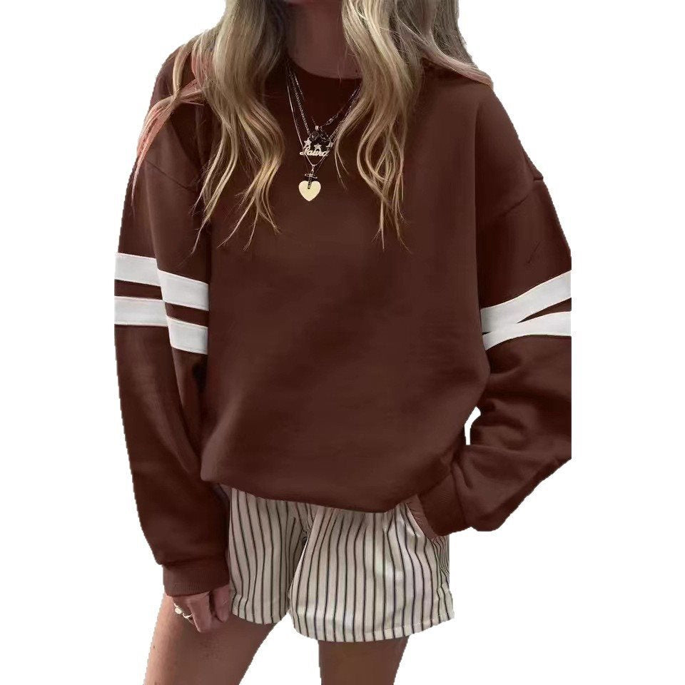 Pull oversized sportif pour femmes avec des accents rayés et une coupe décontractée Chic und Stil