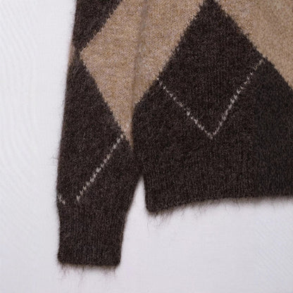 Pull femme tendance avec design en losanges et grand col Chic und Stil