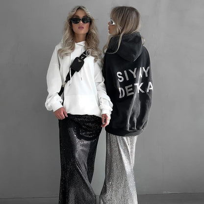 Dame Sweat à capuche oversize avec inscription déclaration Chic und Stil