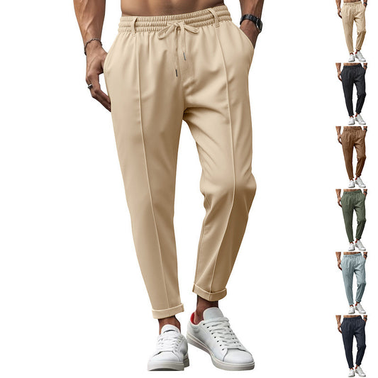 Men's fashionable sports pants with elastic waistband and practical welt pockets Chic and Style