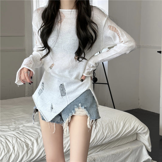 Pull en tricot stylé pour femmes avec des déchirures décontractées et un ourlet asymétrique Chic und Stil
