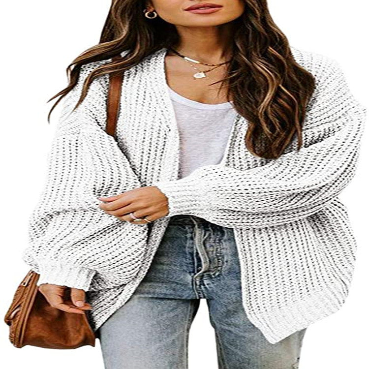 Pull en tricot oversize pour femmes avec des manches ballon et un design structuré Chic und Stil