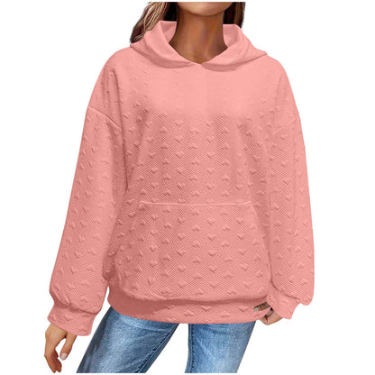 Pull à capuche pour femmes avec motif de cœur texturé Chic und Stil