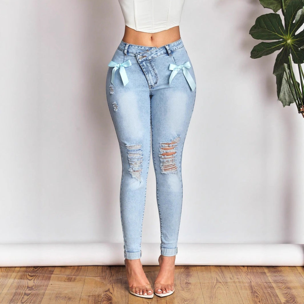 Dames Destroyed Skinny Jeans avec des nœuds fantaisistes Chic und Stil