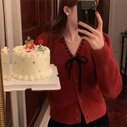 Ladies soft pullover with contrasting buttons and elegant details Chic and Style