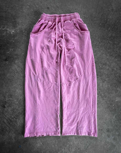 Pantalons en tissu décontractés pour femmes avec taille élastique et poches latérales volumineuses Chic & Stil