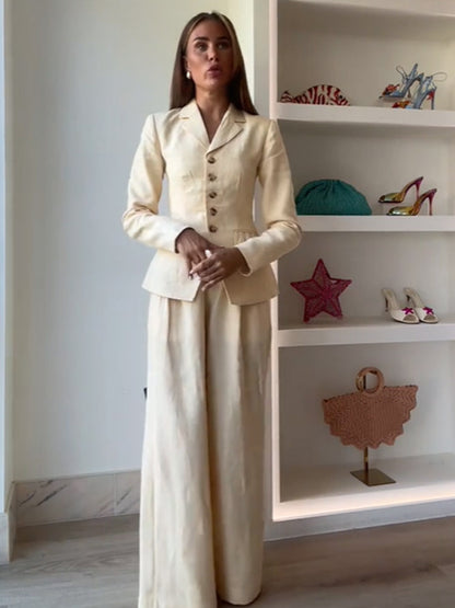 Elegant suit set for women with fitted jacket and wide-leg pants Chic and Style