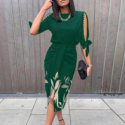 Robe mi-longue pour femmes avec des détails floraux et une fente élégante Chic und Stil
