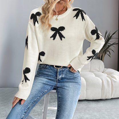 Dames Pull doux avec un motif nœud ludique Chic und Stil