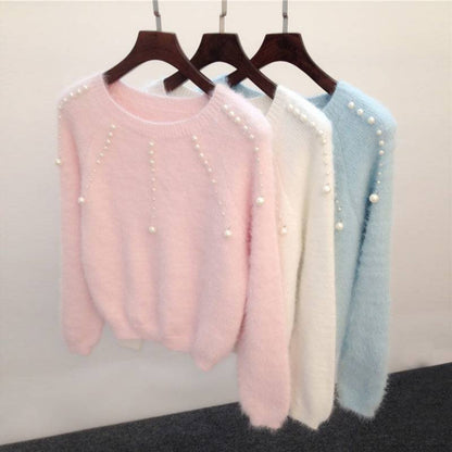 Pull femme élégant avec des accents de perles élégants Chic und Stil