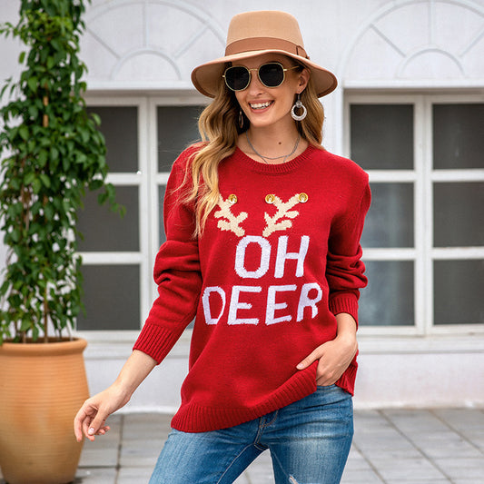 Pull en tricot pour dames avec motif de renne festif et boutons dorés Chic und Stil